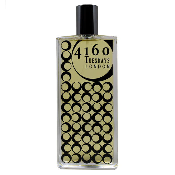 A rectangular perfume bottle with a black cap. The label reads "4160Tuesdays" and features a design of concentric black circles on a golden yellow background, hinting at notes of sandalwood. The product name is Bodhi Language.