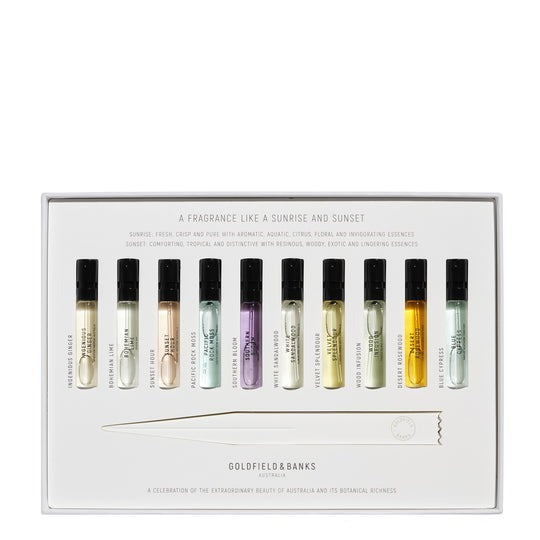 The Goldfield & Banks Discovery Set 10 x 2ml comprises ten petite perfume vials neatly aligned alongside a sleek metallic scent strip tool. The box lid is adorned with detailed descriptions of the opulent fragrances and proudly showcases the esteemed "Goldfield & Banks" branding.