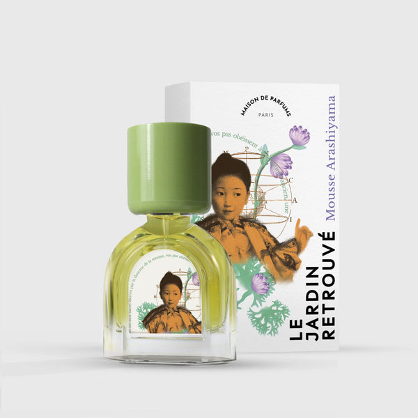 A bottle of Le Jardin Retrouvé Mousse Arashiyama Eau de Parfum comes with a matching box, both adorned with an illustration of a person surrounded by botanical elements inspired by a Japanese bamboo grove.