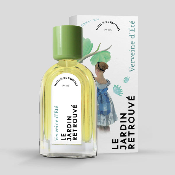 A bottle of "Le Jardin Retrouvé Verveine d'Eté" Eau de Parfum stands in front of its box, which features a painted design of a woman in a blue dress and green foliage, promising a fresh scent that captures the essence of summer.