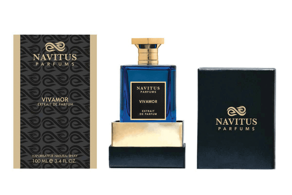 Image of Navitus Parfums "Vivamor" Extrait de Parfum, a celebration of life and love. The blue and gold bottle is shown between its closed box and an open box. The label indicates it is a 100ml, 3.4 FL OZ vaporisateur spray. This exquisite fragrance captures the essence of joy with its vibrant fragrance notes.