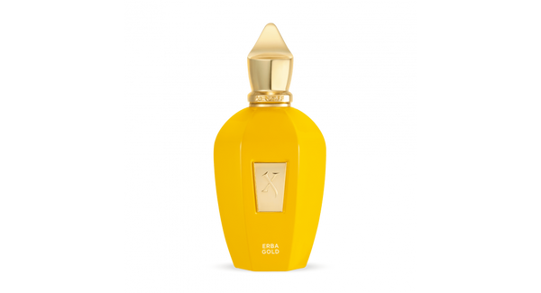 A yellow perfume bottle with a gold cap and a rectangular label, named "Erba Gold" by Xerjoff, featuring citrusy top notes and adorned with a unique silk neck scarf.