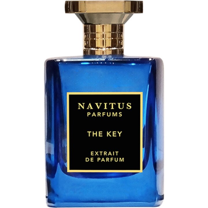 A blue rectangular bottle of Navitus Parfums "The Key," an Extrait de Parfum, a Dominique Ropion perfume, featuring a black and gold label with a gold cap.