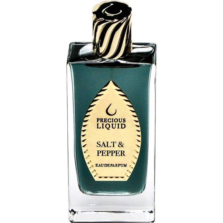 A rectangular perfume bottle from Precious Liquid, labeled "Salt & Pepper," with a gold cap featuring a black swirl design, exuding subtle notes of patchouli and pepper.