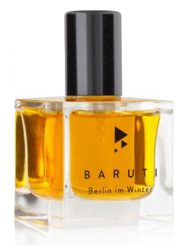 Clear glass bottle with gold-colored liquid perfume, black cap, and sleek black text that reads "Baruti Berlin im Winter." The intoxicating fragrance has a modern edge, exuding a boozy allure that captivates the senses.