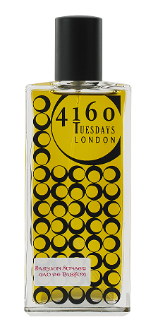 A bottle of 4160Tuesdays perfume with a black cap, yellow label, and circular patterns. Text reads "Babylon Sunset" on a smaller white label at the bottom. This sophisticated fragrance intertwines fragrant fruity florals for an unforgettable scent experience.