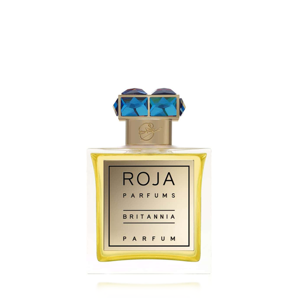 A bottle of Roja Parfums Britannia featuring a gold label and a golden cap adorned with blue gemstones, exquisitely blending notes of Rose de Mai for an elegant touch.