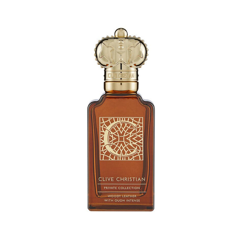 A bottle of Clive Christian C Woody Leather perfume, adorned with a geometric gold pattern on the front. Infused with notes of saffron and tobacco, the elegant bottle features a gold cap and text detailing the name "C Woody Leather" and its scent.