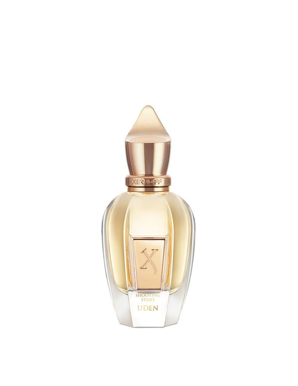 A transparent, elegantly designed modern perfume bottle with a gold-toned cap and label, embossed with the word "Uden" and a logo featuring the number "X". The scent within evokes tropical citrus notes and a saline aquatic fougère essence. Product Name: Uden Brand Name: Xerjoff