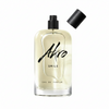 A transparent bottle of Akro's SMILE Eau de Parfum, a unisex fragrance, with a black spray cap removed and placed to the side.
