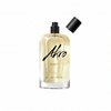 A bottle of NIGHT by Akro. The transparent container, accompanied by a black cap placed aside, reveals a spray nozzle, while the light amber liquid inside suggests musky notes and Bulgarian rose essences.