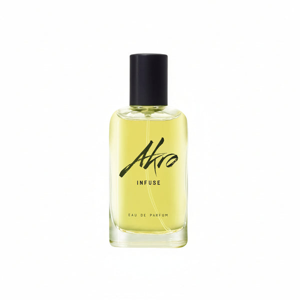 A bottle of perfume labeled "INFUSE by Akro" with a black cap and light yellow liquid inside, reminiscent of an Oolong brew fragrance that tea connoisseurs will appreciate.