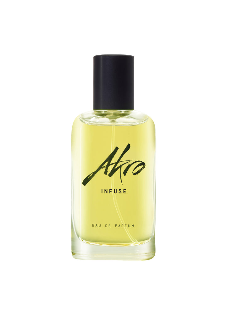 A bottle of perfume labeled "INFUSE by Akro" with a black cap and light yellow liquid inside, reminiscent of an Oolong brew fragrance that tea connoisseurs will appreciate.