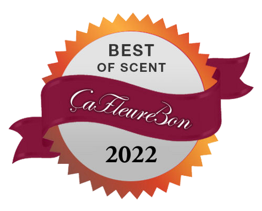 The Gold Spot by Sarah Baker, awarded the "Best of Scent ÇaFleureBon 2022" badge with a jagged edge, showcases a maroon ribbon across the center and offers subtle hints of caramel-oud that evoke the opulence of an Extrait de Parfum.