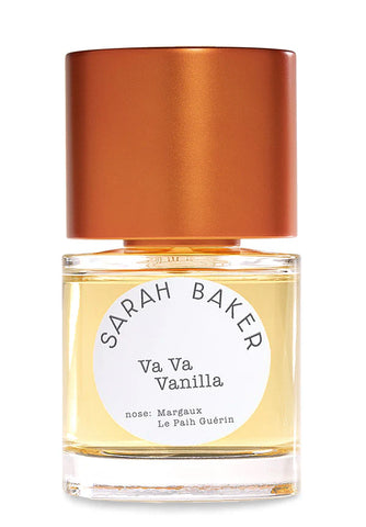 Sarah Baker vanilla perfume bottle with amber-orange cap and clear front label.