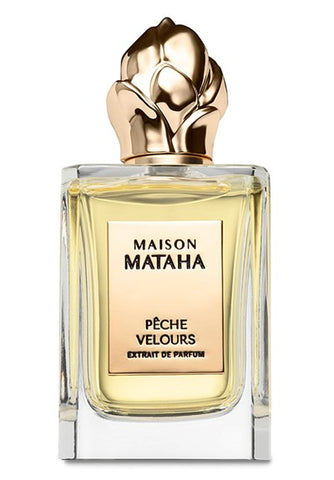 Peach Velours parfum bottle, clear glass with gold cap and cream label