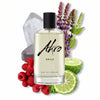 A bottle of Akro SMILE Eau de Parfum, celebrated for its unisex scent, is showcased with accompanying elements including raspberries, a bergamot slice, a crystal rock, and sprigs of lavender.