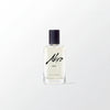 Eau de parfum bottle with black cap, clear glass, Ahro Heat label on front