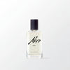 Eau de parfum bottle with black cap, clear glass, Ahro logo and Heat label