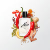 Heat eau de parfum bottle with black cap, clear glass, Ahro label and Heat text