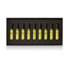 The AKRO 9 x 2ml Discovery Kit by Akro features nine perfume sample vials, labeled: HAZE, DARK, BAR, RISE, SMOKE, HALF, MALT, NIGHT, and INK. These indulgent scents are arranged neatly in a black rectangular box.