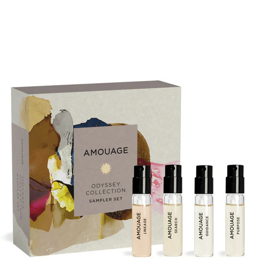 Image of the Amouage Amouage Odyssey Collection Sampler Set 4 x 2ml, featuring four Eau de Parfum vials labeled "Lilac Love," "Imitation Woman," "Gold Woman," and "Honor." The vials are elegantly arranged in front of a decorative box, showcasing a symphony of luxurious fragrances.
