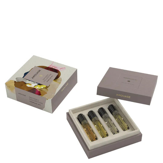 A box with four small Eau de Parfum vials, each with a black cap. The box has a purple lid and abstract design. The brand name, "Amouage," and the product name, "Amouage Odyssey Collection Sampler Set 4 x 2ml," are prominently visible on the lid.