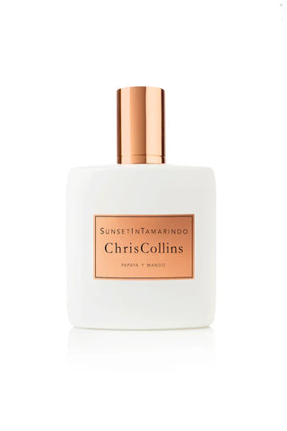 White frosted fragrance bottle with copper cap; Chris Collins label, papaya & mango
