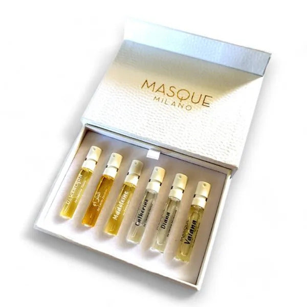 A white box labeled "Masque LE DONNE DI MASQUE DISCOVERY KIT 6 X 2ML" from Masque Milano, containing six small glass vials of different fragrances.