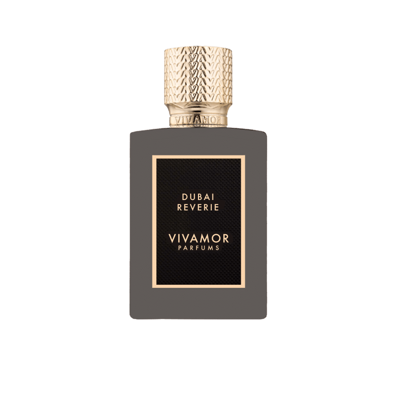A rectangular perfume bottle labeled "Dubai Reverie VIVAMOR Parfums" with a textured gold cap. The bottle is dark with a black and gold label, hinting at notes of Madagascan Vanilla Cream.