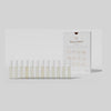 Image of a "Gallivant Nomad Set 2024" from Gallivant Perfumes, featuring eleven transparent spray bottles, each containing a unique unisex EAU DE PARFUM, neatly lined up in front of an elegant white packaging box.