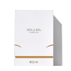 A white box with gold text that reads "Isola Sol" and "Roja Parfums" at the bottom, evoking a luxurious summer holiday essence crafted by Roja Dove.