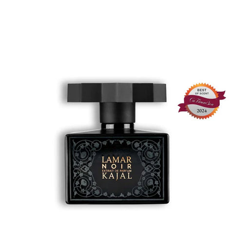 Perfume spray bottle with black cap and ornate Kajal label