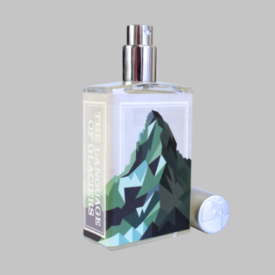 The "The Language of Glaciers" by Imaginary Authors features a rectangular perfume bottle adorned with a mountain graphic. The bottle includes a spray nozzle and an adjacent cylindrical cap, evoking the allure of a moonlit snowshoe trek.