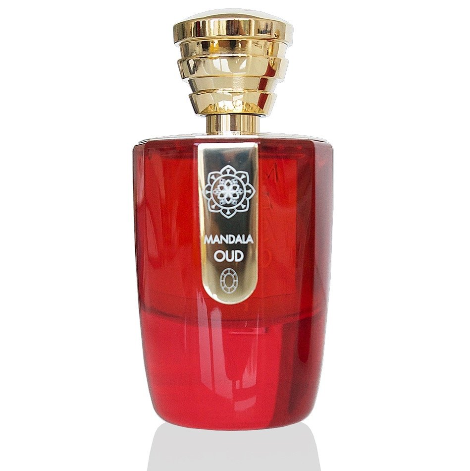 A red perfume bottle with a gold cap and a label reading "Mandala Oud" by Masque Milano, showcasing an exquisite oriental fragrance.