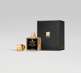 A bottle of "New York 5th Avenue," a woody perfume with sweet floral notes by Fragrance Du Bois, featuring a golden cap, is placed next to its black and gold box packaging against a gray background.