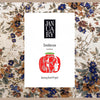 Smolderose fragrance packaging insert card with JANUARY logo and red graphic seal