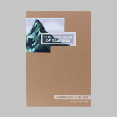 A cardboard box adorned with a mountain graphic and the text "The Language of Glaciers" at the top. Below it, the brand name "Imaginary Authors Unisex Perfume" is displayed. This fragrance captures the essence of moonlit snowshoe adventures and crafts a romantic epic with every spritz.