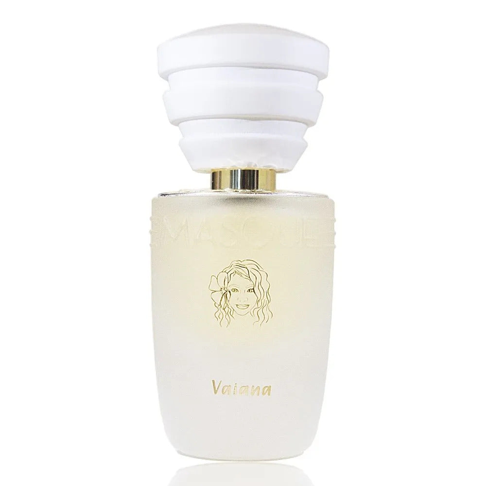 The Vaiana perfume bottle by Masque Milano is white and showcases a gold drawing of a woman's face on the front, with the word "Vaiana" beneath it. Infused with Tiare Flower essence, the bottle is topped with a white cap that has gold trim.