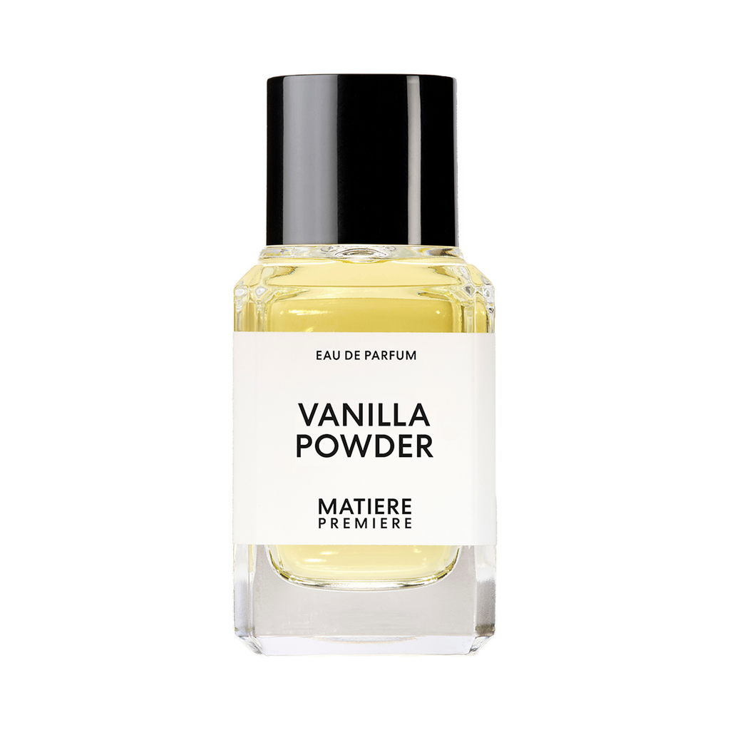 A bottle of VANILLA POWDER labeled "Vanilla Powder" by Matiere Premiere, featuring a clear glass container with a black cap and white label, enriched with subtle hints of musk.