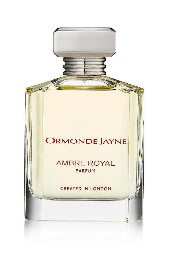 Clear perfume bottle with a silver cap labeled "Ormonde Jayne Ambre Royal Parfum" and "CREATED IN LONDON," exuding an elegant blend of jasmine and roses.