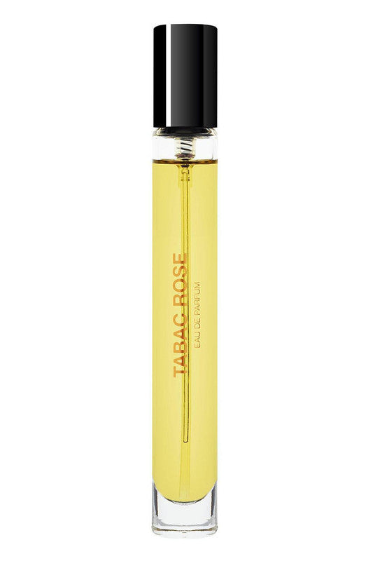 A cylindrical glass bottle labeled "Tabac Rose" by BDK Parfums, filled with yellow liquid and topped with a black cap, exudes the opulent tobacco essence intertwined with the rich fragrance of Turkish rose.