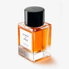 Champs de Provence fragrance bottle, orange glass with black cap