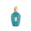 A blue perfume bottle with a gold cap, labeled "Erba Pura" by Xerjoff and featuring a central gold emblem, set against a black background, hints at the essence of a Mediterranean fruit basket.