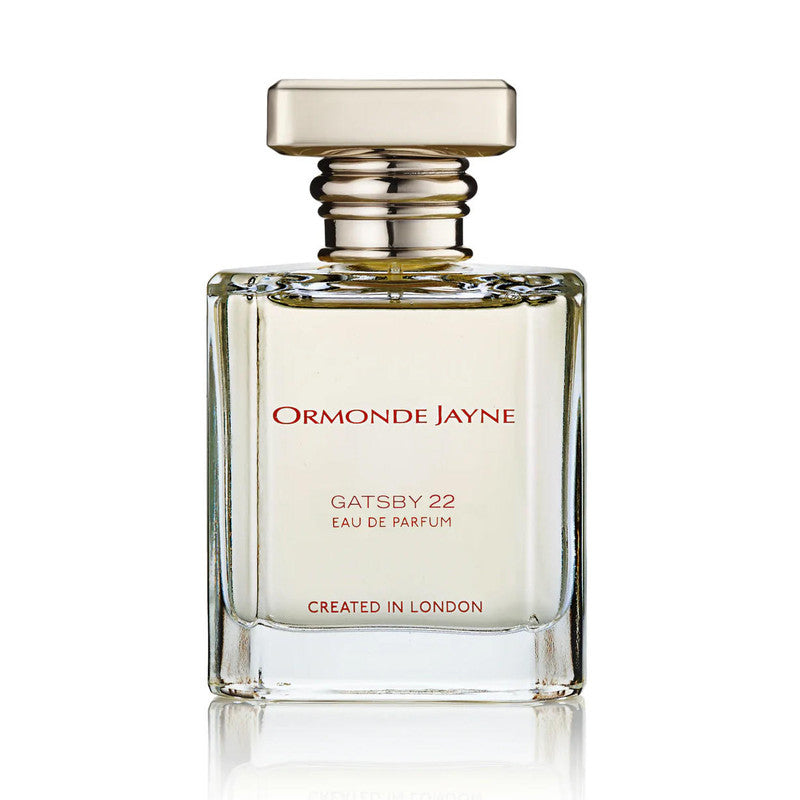 A bottle of Gatsby 22 Eau de Parfum by Ormonde Jayne features a rectangular glass design and a metallic cap. The label reads "Created in London." This fragrance boasts captivating notes of vetiver and Sicilian lemon, perfectly encapsulating the essence of sophistication.