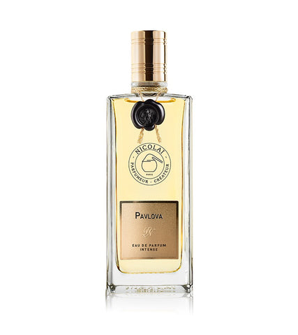 Pavlova perfume bottle with gold cap, glass body, and dark flower emblem label