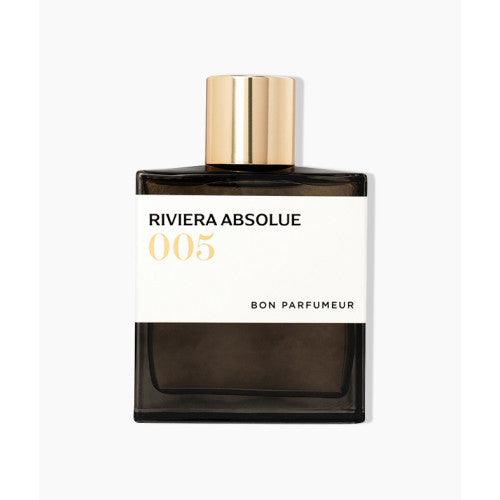 Square perfume bottle with gold cap, dark base, and white '005' label
