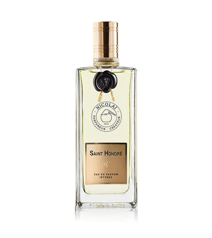 Saint Honoré eau de parfum bottle with gold cap and rectangular clear glass flacon
