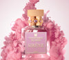 A bottle of "SIRÈNE" by Fragrance Du Bois perfume with a pink liquid inside, surrounded by swirling pink smoke. The bottle features a gold cap adorned with pink gemstones, exuding a female-inspired fragrance that promises a seductive burst of cherries.