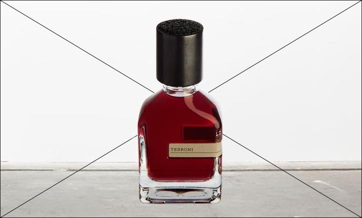 A bottle of Orto Parisi's TERRONI perfume, crafted by Alessandro Gualtieri, with a black cap is placed on a gray surface against a plain white background.